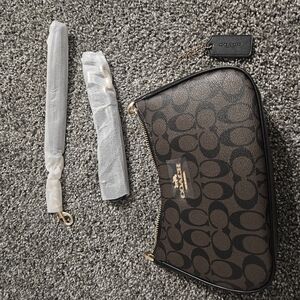 Coach Black and Gold Zippered Pouch